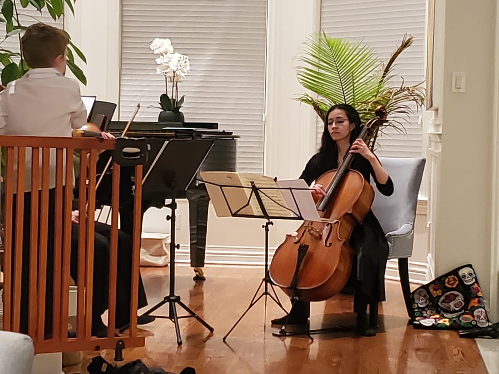 Cellist performing at an elegant candlelit event